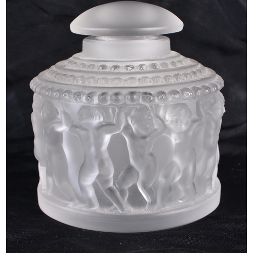 503 - A LALIQUE GLASS NUDE SCENT BOTTLE AND STOPPER. 10 cm x 9 cm.