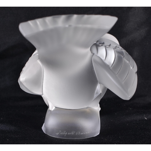 505 - A LALIQUE GLASS BIRD. 10 cm wide.