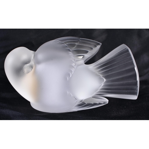 505 - A LALIQUE GLASS BIRD. 10 cm wide.