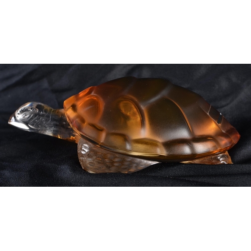 506 - A LALIQUE AMBER GLASS TORTOISE. 14 cm wide.