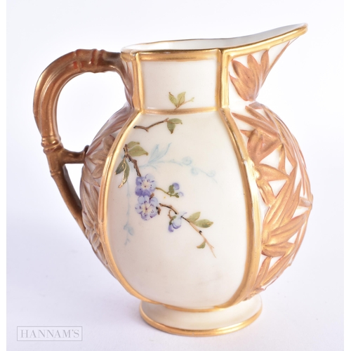 51 - A ROYAL WORCESTER AESTHETIC MOVEMENT PORCELAIN JUG painted with birds and bamboo. 11 cm high.