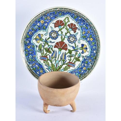 514 - AN IZNIK FAIENCE DISH together with a studio pottery censer. Largest 24 cm diameter. (2)