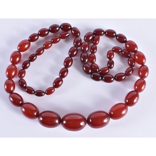 518 - Bakelite Bead Necklace For Restringing.  66 grams. 80 cm long, largest bead 2.5 cm x 2 cm.