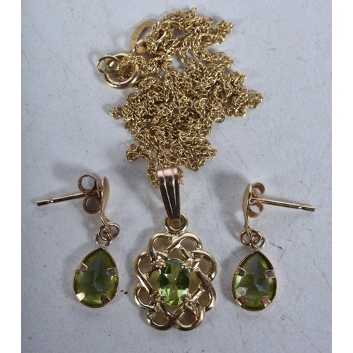 523 - A 9 Carat Gold Peridot Pendant Necklace with Matching Earrings.  Stamped 375,  Pendant 2.2cm x 1 cm,... 