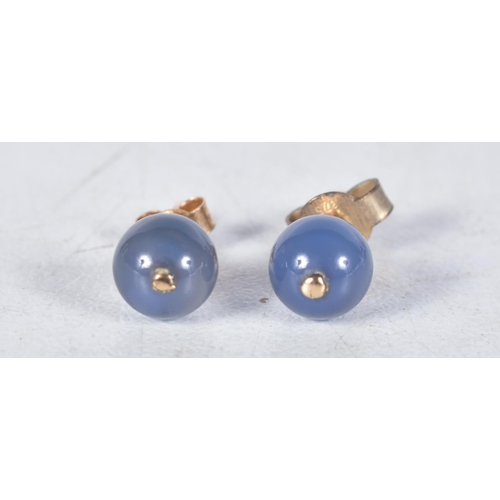 527 - A Pair of 9 Carat Gold Blue Chalcedony Stud Earrings.  0.6cm diameter, weight 1g