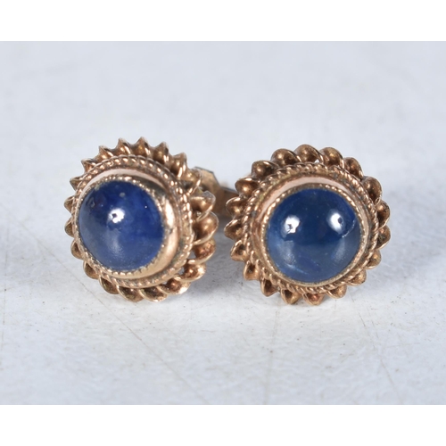 528 - A Pair of 9 Carat Gold Sapphire Stud Earrings.  Stamped 375.  0.8 cm diameter, weight 1.1g