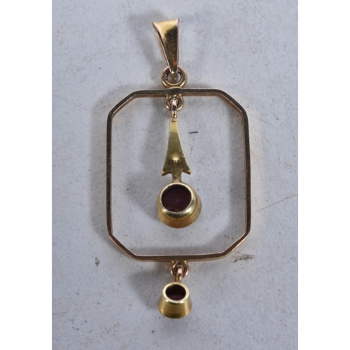 536 - A 15 Carat Gold Antique Garnet & Seed Pearl Pendant.  Stamped 15K.  3.4cm x 14.6cm, weight 1.3g