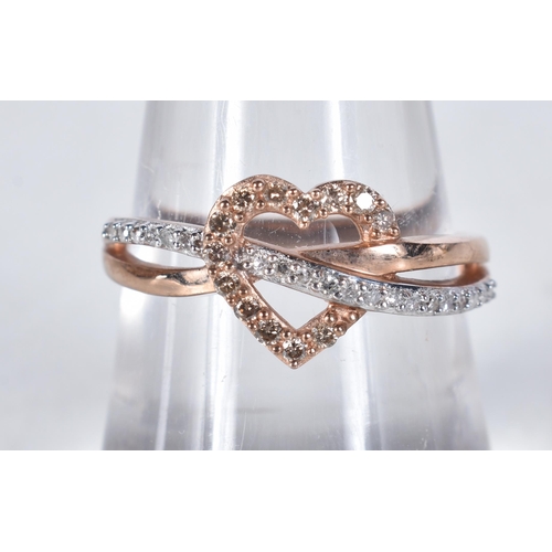 553 - A 9 Carat Gold Diamond Heart Shape Ring.  Stamped 375.  Total Diamond Weight: 0.20ct (approximately)... 