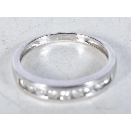 555 - A 9 Carat Gold Diamond Half Eternity Ring.  Stamped 375.  Size L, weight 1.8g