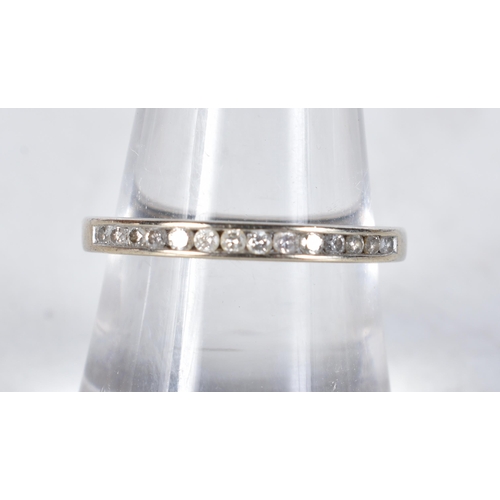 557 - A 9 Carat Gold Diamond Half Eternity Ring.  Stamped 375.  Size P, weight 2.6g