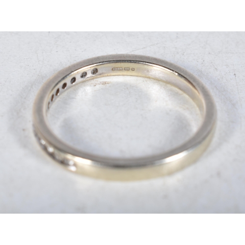 557 - A 9 Carat Gold Diamond Half Eternity Ring.  Stamped 375.  Size P, weight 2.6g