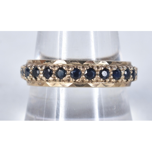 559 - A 9 Carat Gold Sapphire Full Eternity Ring.  Stamped 375.  Size S, weight 2.5g