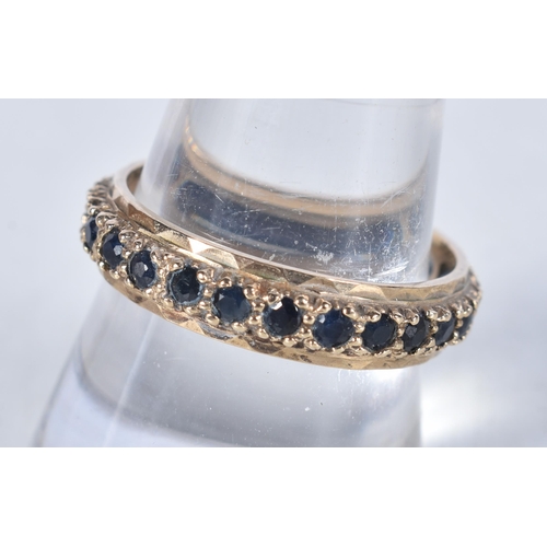 559 - A 9 Carat Gold Sapphire Full Eternity Ring.  Stamped 375.  Size S, weight 2.5g