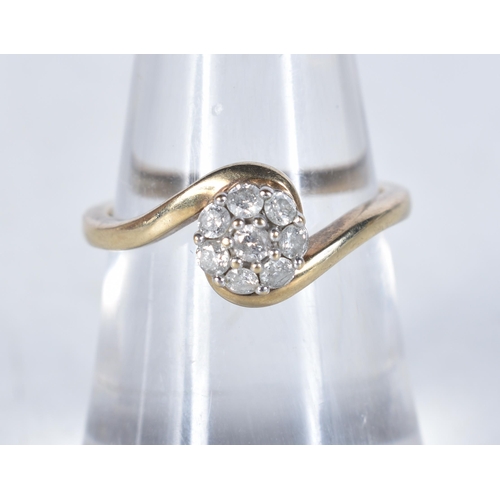 561 - A 9 Carat Gold Diamond Cluster Ring.  Total Diamond Weight: 0.25ct (approximately).  Stamped 375.  S... 