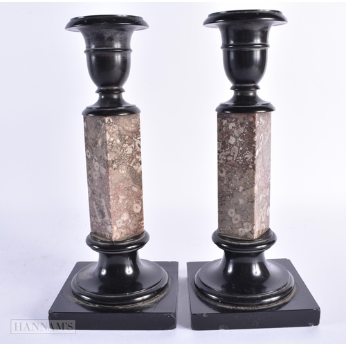 61 - A LOVELY PAIR OF 19TH CENTURY GRAND TOUR FOSSILISED MARBLE CANDLESTICKS. 24.5 cm high.