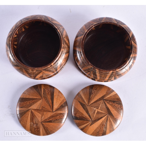 62 - A PAIR OF ANTIQUE TREEN WOOD BOXES AND COVERS. 9 cm wide.