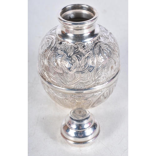 625 - A Continental Silver Tea Caddy with Raised Floral Decoration.  Foreign Silver Marks.  9.1 cm x 6.2cm... 