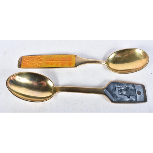 632 - Two very fine vintage mid-century Danish gilt silver spoons with inset enamel designs by Anton Miche... 