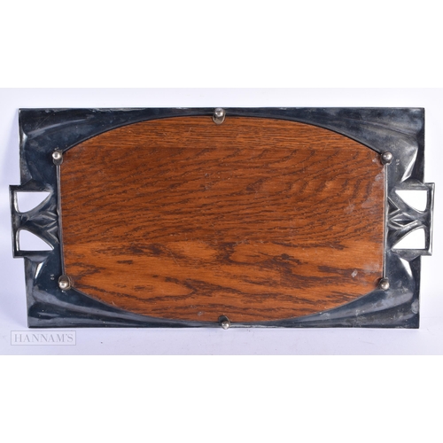 64 - A LARGE ART NOUVEAU WMF PEWTER AND CARVED WOOD TWIN HANDLED TRAY. 50 cm x 27 cm.