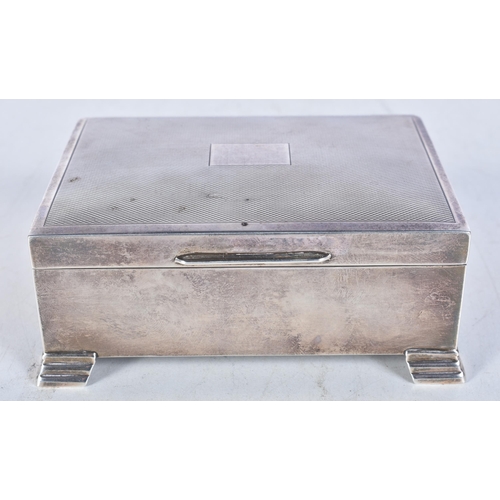 644 - A Silver Wood Lined Cigarette Box with Engine Turned Decoration and Vacant Cartouche by Viners Ltd. ... 