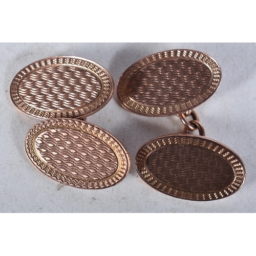 655 - A Pair of 9 Carat Rose Gold Cufflinks in fitted box.  Stamped 375.  1.9cm x 1.2cm, total weight 9.93... 