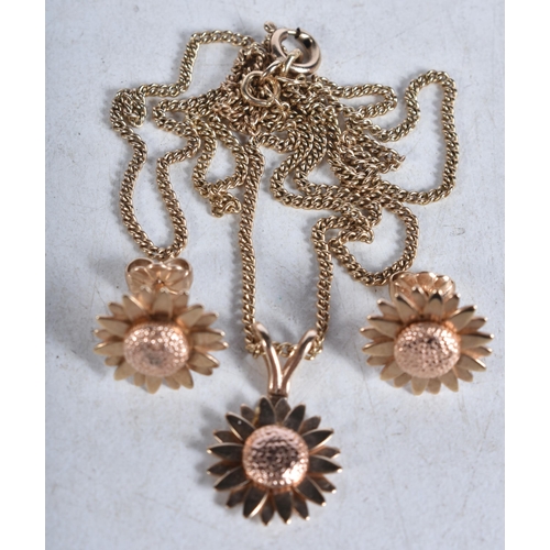 658 - A Suite of 9 Carat Gold Sunflower Pattern Pendant Necklace and Matching Earrings in a fitted case. S... 