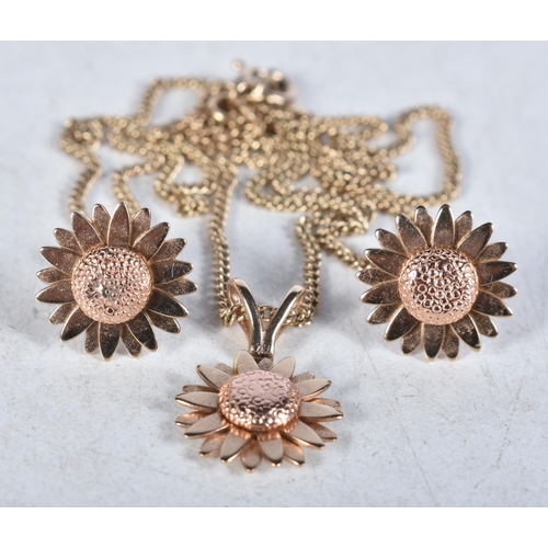 658 - A Suite of 9 Carat Gold Sunflower Pattern Pendant Necklace and Matching Earrings in a fitted case. S... 