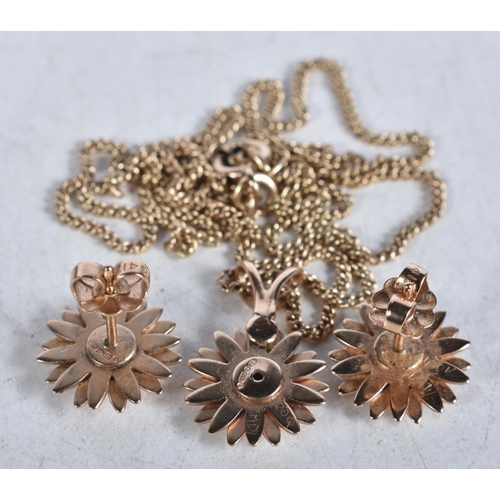 658 - A Suite of 9 Carat Gold Sunflower Pattern Pendant Necklace and Matching Earrings in a fitted case. S... 