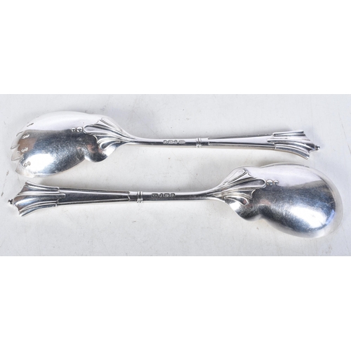 681 - A Pair of Victorian Silver Serving Spoons by Aitkin Brothers.  Hallmarked Sheffield 1895.  22.5cm x ... 