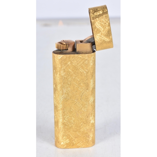 685 - Cartier Gold Plated Brushed Textured lighter- Working.  7cm x 2.5cm x 1.2cm