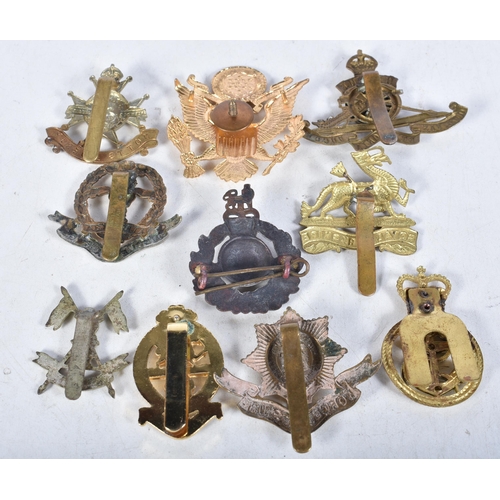 688 - Ten Assorted Military Cap Badges (10)