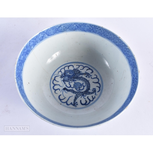 69 - A 19TH CENTURY CHINESE BLUE AND WHITE PORCELAIN DRAGON BOWL bearing Kangxi marks to base. 20.5 cm di... 