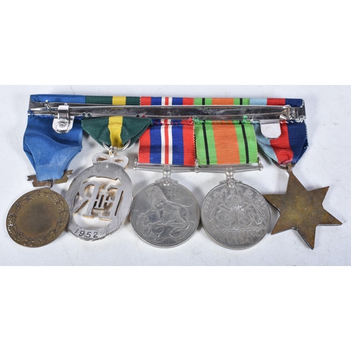 699 - Mounted Medal Group incl WW II Trio and a King Haakon VII Freedom Medal together with a TA Efficienc... 