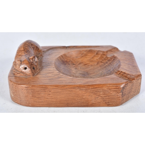 702 - ROBERT THOMPSON OF KILBURN, A MOUSEMAN OAK ASHTRAY of typical form, with carved mouse signature. 10.... 