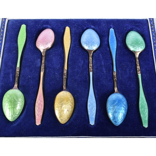 703 - A Cased Set of Six Silver Gilt an Guilloche Enamel Coffee Spoons by Henry Clifford Davis.  Hallmarke... 