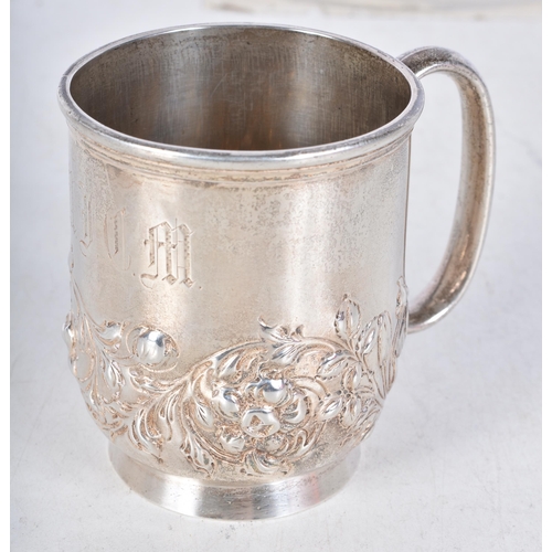 706 - A Victorian Silver Drinking Mug with Embossed Floral Decoration by Thomas Goodfellow.  Hallmarked Lo... 