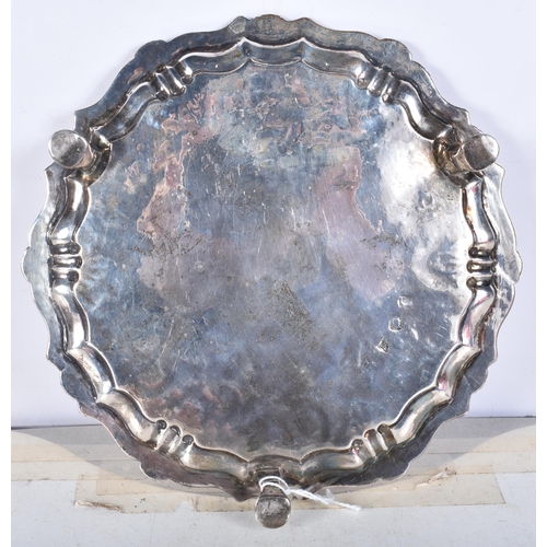 708 - A Georgian Silver Tray with Three Hoof Feet.  Hallmarked London 1798.  16.5cm diameter x 2.6cm, weig... 