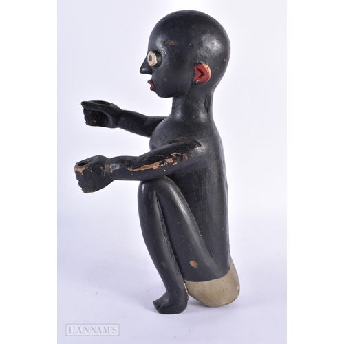 74 - AN UNUSUAL 19TH CENTURY ARTICULATED CARVED WOOD FOLK ART BOY. 35.5 cm high.