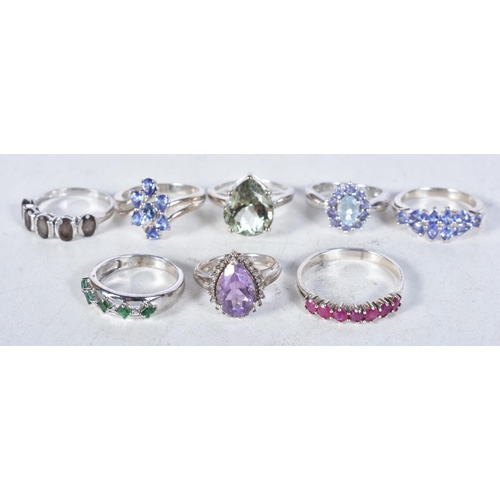 741 - 8 Sterling Silver Rings set with Gems.  Stamped 925.  Sizes K, O, R, S, P, X.  Total weight 28.7g (8... 