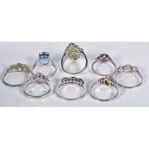 744 - 8 Sterling Silver Rings set with Gems.  Stamped 925.  Sizes M, O, R, T, P.  Total weight 24.3g (8)