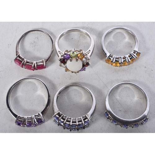 745 - 6 Sterling Silver Rings set with Gems.  Stamped 925.  Sizes L, O, S, V, P.  Total weight 18.1g (8)