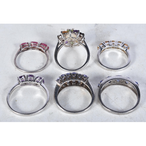 745 - 6 Sterling Silver Rings set with Gems.  Stamped 925.  Sizes L, O, S, V, P.  Total weight 18.1g (8)