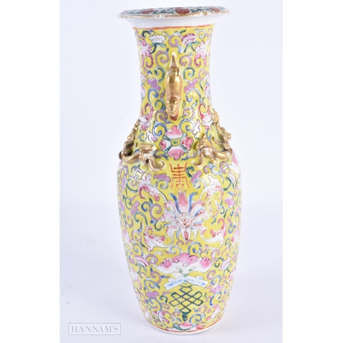 80 - A 19TH CENTURY CHINESE FAMILLE JAUNE PORCELAIN VASE Qing, painted with flowers and bats. 26 cm high.