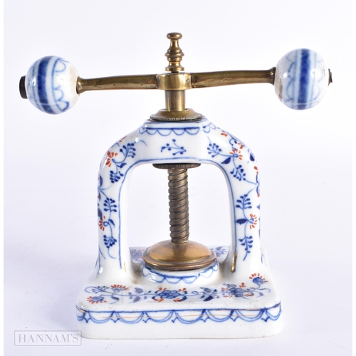 88 - AN UNUSUAL ANTIQUE GERMAN PORCELAIN TABLE NUTCRACKER Attributed to Meissen. 14 cm x 14 cm unextended... 