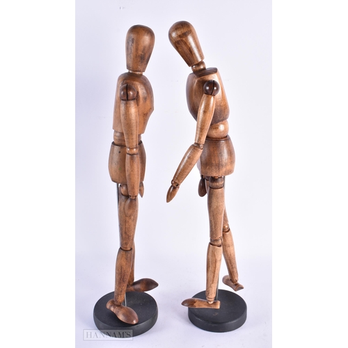 90 - A PAIR OF VINTAGE TREEN CARVED WOOD ARTISTS LAY DOLL SHOP DISPLAYS. 41 cm high.