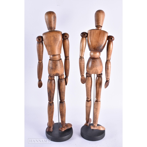 90 - A PAIR OF VINTAGE TREEN CARVED WOOD ARTISTS LAY DOLL SHOP DISPLAYS. 41 cm high.