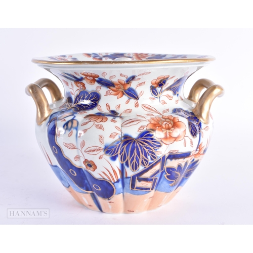 96 - AN EARLY 19TH CENTURY IMARI TWIN HANDLED PORCELAIN ICE PAIL AND COVER painted with landscapes. 16 cm... 