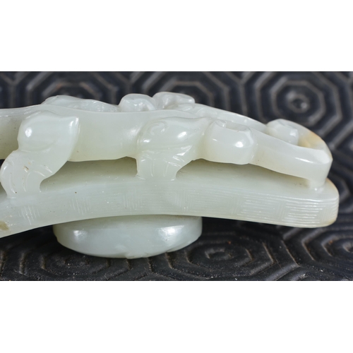 1054 - AN 18TH CENTURY CHINESE CARVED GREENISH WHITE JADE BELT HOOK Qing. 12 cm long.