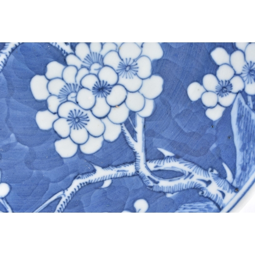 1060 - A 19TH CENTURY CHINESE BLUE AND WHITE PORCELAIN PRUNUS PLATE Qing. 24 cm diameter.