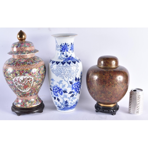 1081 - A CHINESE REPUBLICAN PERIOD GINGER JAR AND COVER together with two porcelain vases. Largest 40 cm hi... 